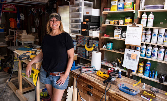 Danielle in her Southern Indiana workshop building handmade wood pieces for Dani Denise Design