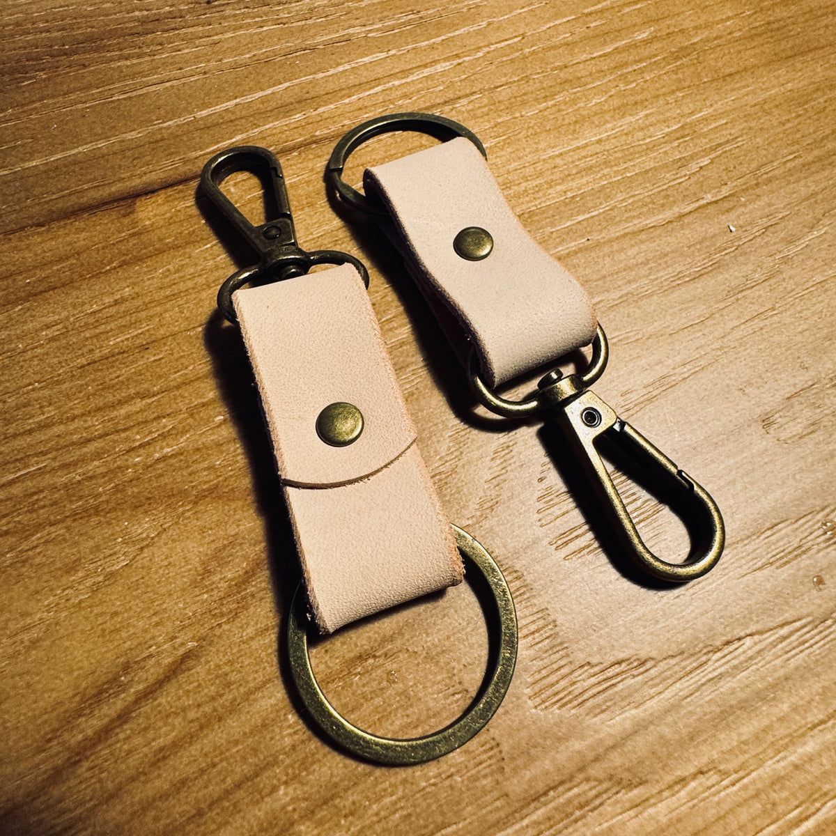 Natural minimalist leather keychain with antique brass hardware